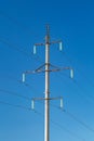 Electrical wires with insulators on concrete pillar high-voltage power transmission line Royalty Free Stock Photo