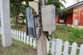 The electrical wiring control box is mounted on an outdoor pole. Royalty Free Stock Photo