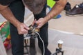 Electrician assembling chandelier