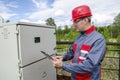 Electrician builder engineer checking data Royalty Free Stock Photo