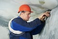 Electrician at cable wiring work Royalty Free Stock Photo