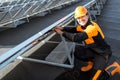 Electrician connecting solar panels