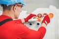 Electrician Contractor Installing Power Socket Royalty Free Stock Photo