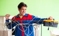 Electrician contractor with tangled cables