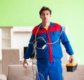 Electrician contractor with tangled cables Royalty Free Stock Photo