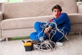 The electrician contractor with tangled cables Royalty Free Stock Photo