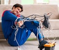 Electrician contractor with tangled cables