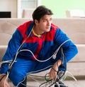 Electrician contractor with tangled cables