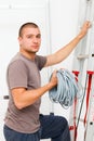 Electrician with Cords