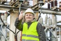 Electrician in electrical substation Royalty Free Stock Photo
