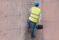 Electrician, engineer and handyman on ladder with tools working on building electricity maintenance. Home renovation Royalty Free Stock Photo