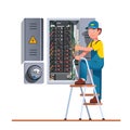 Electrician engineer man working with fuse box Royalty Free Stock Photo