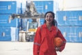 Electrician engineer woman hand holding orange hard hat. Royalty Free Stock Photo