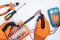 Electrician examining, control fusebox Royalty Free Stock Photo