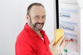 electrician examining current voltage with screwdriver tester Royalty Free Stock Photo