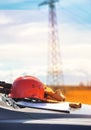 An electrician in the fields near the power transmission line. T Royalty Free Stock Photo