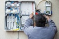 Electrician fixing a fuse Royalty Free Stock Photo