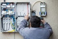 Electrician fixing a fuse Royalty Free Stock Photo