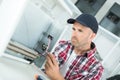 electrician inspecting energy conductor Royalty Free Stock Photo