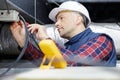 electrician installer with tool in hands Royalty Free Stock Photo