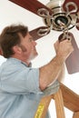 Electrician Installing Ceiling Fan Royalty Free Stock Photo