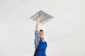 Electrician Installing Ceiling Light Royalty Free Stock Photo