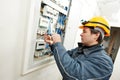 Electrician installing energy saving meter