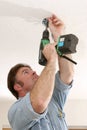 Electrician Installing Fan Box Royalty Free Stock Photo