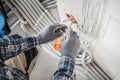 Electrician Installing Power Socket Royalty Free Stock Photo