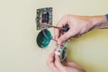 Electrician Installing Socket In New House Royalty Free Stock Photo