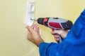 Electrician Installing Socket In New House Royalty Free Stock Photo