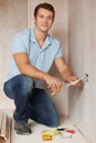 Electrician Installing Socket In New House Royalty Free Stock Photo