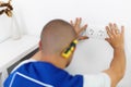 Electrician Installing Wall Socket. Worker