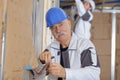 Electrician installing wires beforehand