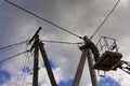 Work on electric post power pole Electrician lineman repairman worker at climbing Royalty Free Stock Photo