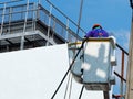 Electrician man working at height and dangerous Royalty Free Stock Photo