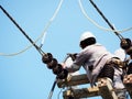 Electrician man working at height and dangerous Royalty Free Stock Photo