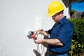 Electrician Measures Voltage