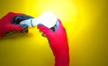 Electrician peeling off insulation from wires - closeup on hands and pliers. Selective focus Royalty Free Stock Photo