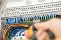 Electrician repairing faulty wiring