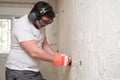 Electrician repairman working at a construction site Royalty Free Stock Photo