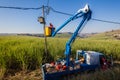 Electrician Repairs Truck Hoist