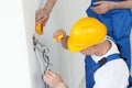 Electrician stripping electrical wires Royalty Free Stock Photo