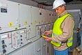 Electrician in switching power Royalty Free Stock Photo