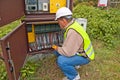 Electrician in switching power Royalty Free Stock Photo