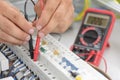 Electrician Testing an Electric Smart Panel