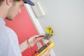 Electrician using multi meter Royalty Free Stock Photo