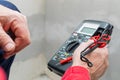 Electrician using voltmeter Royalty Free Stock Photo