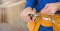 Electrician with wires cables on building site Royalty Free Stock Photo