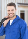 Electrician with wires cables on building site Royalty Free Stock Photo